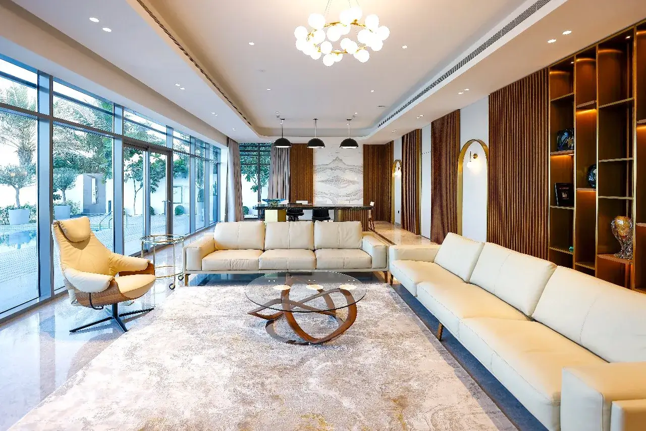 A modernly furnished living room with sleek furniture and contemporary décor.
