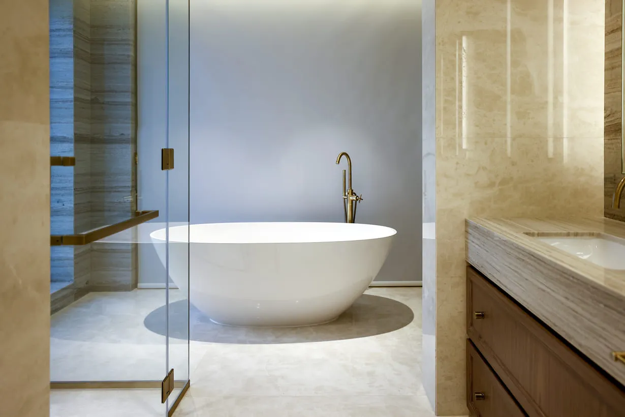 a white bathtub in a bathroom