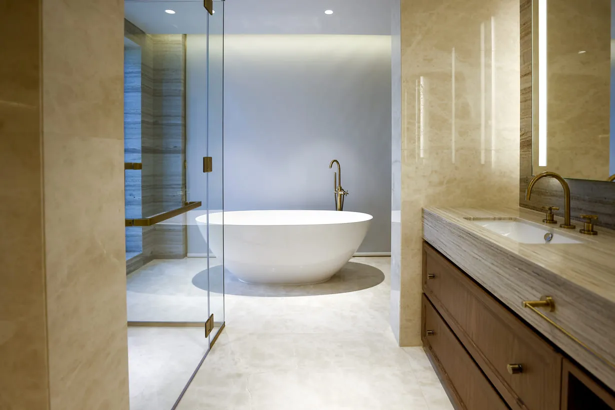 A luxurious bathroom featuring a spacious bathtub and a convenient walk-in shower. Relax and rejuvenate in style.