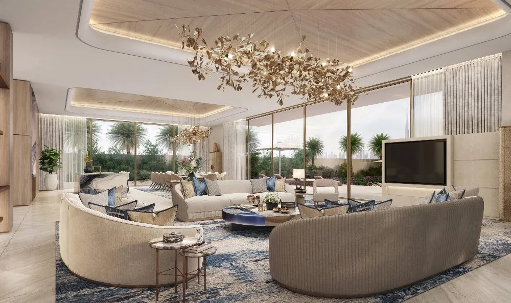 A beautifully decorated living room with an elegant, oversized chandelier.