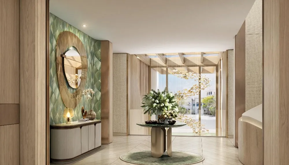 A hallway with a decorative vase displayed on the wall next to a large mirror.