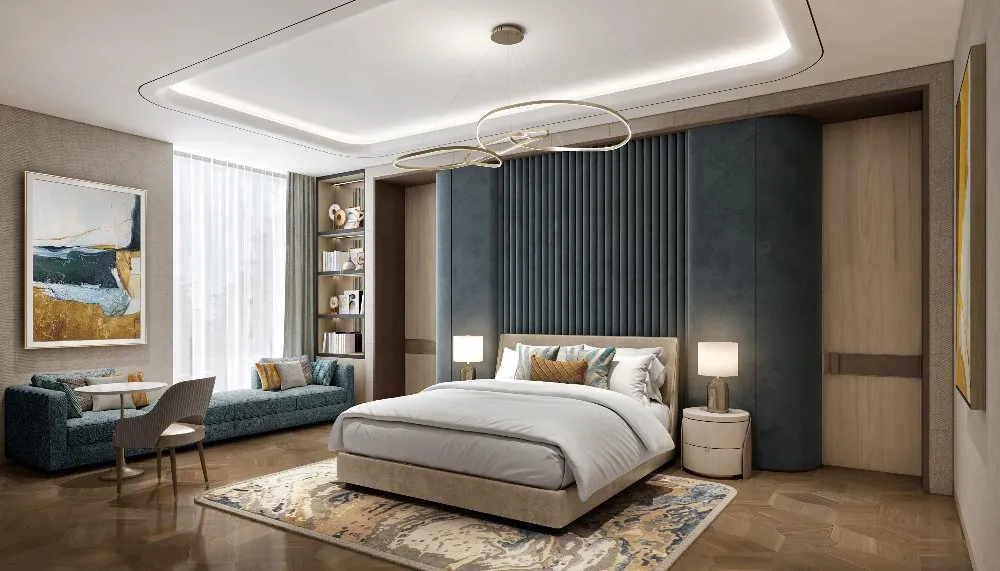 A cozy modern bedroom with a spacious bed and a sleek desk for work or study.